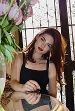 Ukrainian mail order bride Anastasia from Mohyliv-Podilskyi with red hair and brown eye color - image 9