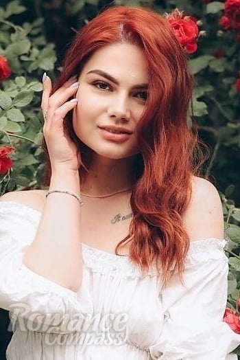 Ukrainian mail order bride Anastasia from Mohyliv-Podilskyi with red hair and brown eye color - image 1