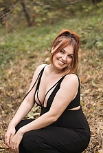 Ukrainian mail order bride Anastasia from Lviv with red hair and green eye color - image 4