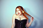 Ukrainian mail order bride Anastasia from Lviv with red hair and green eye color - image 6