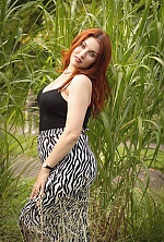 Ukrainian mail order bride Anastasia from Lviv with red hair and green eye color - image 5