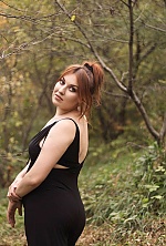 Ukrainian mail order bride Anastasia from Lviv with red hair and green eye color - image 11