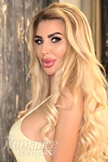 Ukrainian mail order bride Olga from Los Angeles with light brown hair and green eye color - image 1