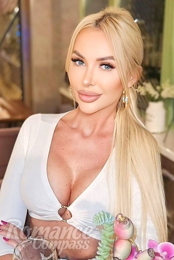 Ukrainian mail order bride Mirabela from Bucharest with blonde hair and blue eye color - image 1