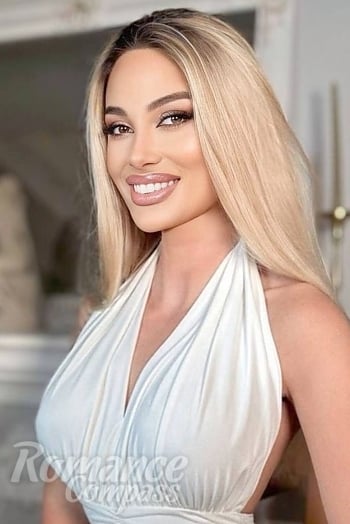 Ukrainian mail order bride Nino from Tbilisi with blonde hair and brown eye color - image 1