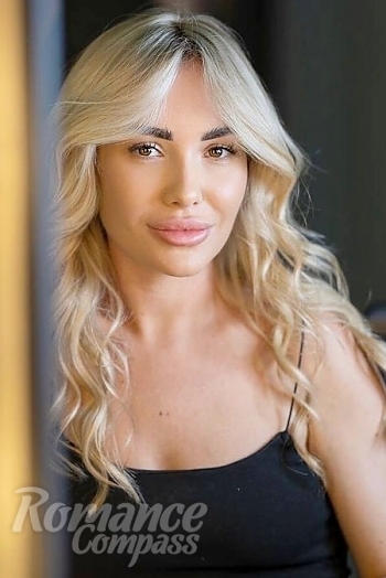 Ukrainian mail order bride Anastasia from Milan with blonde hair and brown eye color - image 1