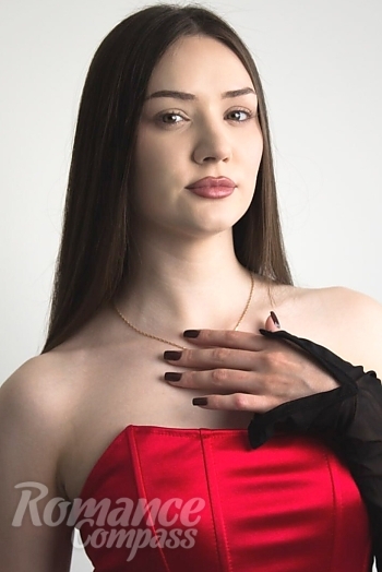 Ukrainian mail order bride Vladyslava from Kiev with black hair and grey eye color - image 1