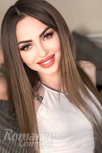 Ukrainian mail order bride Nadezhda from Dnipro with light brown hair and brown eye color - image 1