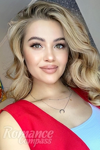 Ukrainian mail order bride Liubov from Berlin with light brown hair and brown eye color - image 1