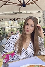 Ukrainian mail order bride Ksenia from London with light brown hair and green eye color - image 2