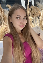 Ukrainian mail order bride Yuliia from Odesa with light brown hair and green eye color - image 2