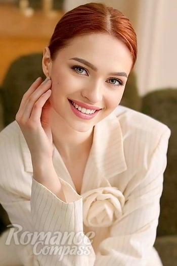 Ukrainian mail order bride Kateryna from Lviv with red hair and green eye color - image 1