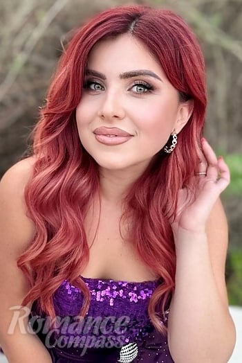 Ukrainian mail order bride Tetiana from Odessa with red hair and green eye color - image 1