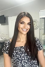 Ukrainian mail order bride Zoryana from Paris with black hair and grey eye color - image 4