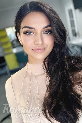 Ukrainian mail order bride Zoryana from Paris with black hair and grey eye color - image 1