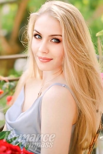 Ukrainian mail order bride Daria from Kiev with blonde hair and blue eye color - image 1