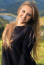 Ukrainian mail order bride Karina from Kiev with light brown hair and green eye color - image 10