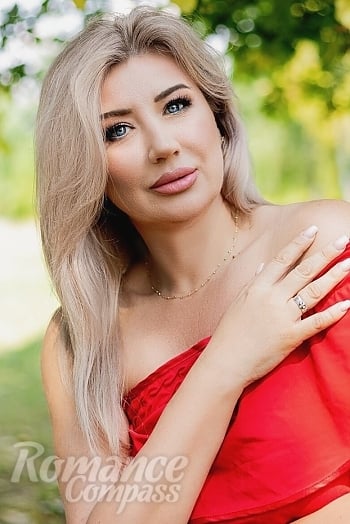 Ukrainian mail order bride Svitlana from Berlin with blonde hair and blue eye color - image 1