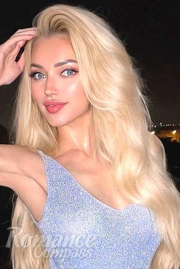 Ukrainian mail order bride Anna from Kiev with blonde hair and blue eye color - image 1