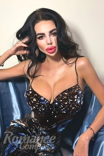 Ukrainian mail order bride Polina from Kiev with black hair and green eye color - image 1