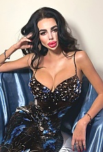 Ukrainian mail order bride Polina from Kiev with black hair and green eye color - image 2