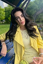 Ukrainian mail order bride Polina from Kiev with black hair and green eye color - image 9