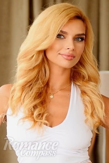 Ukrainian mail order bride Alena from Kyiv with blonde hair and green eye color - image 1