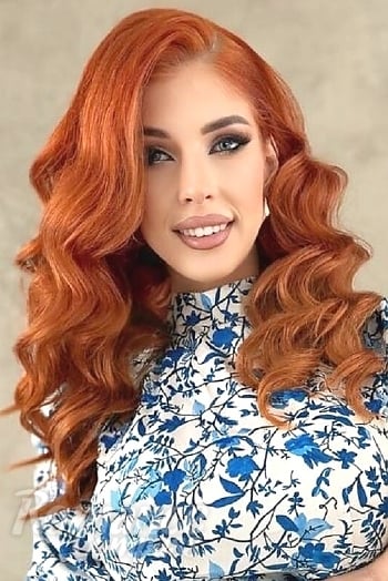 Ukrainian mail order bride Anastasia from Kyiv with red hair and blue eye color - image 1