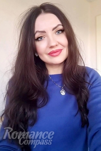 Ukrainian mail order bride Dariia from Almaty with auburn hair and blue eye color - image 1