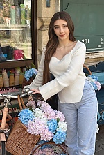 Ukrainian mail order bride Yana from Ivano-Frankivsk with light brown hair and green eye color - image 17