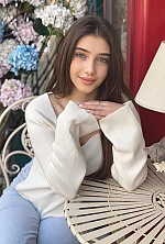 Ukrainian mail order bride Yana from Ivano-Frankivsk with light brown hair and green eye color - image 19