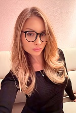 Ukrainian mail order bride Olena from Kyiv with blonde hair and blue eye color - image 15