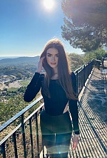 Ukrainian mail order bride Daryna from Kyiv with light brown hair and green eye color - image 2