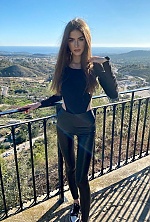 Ukrainian mail order bride Daryna from Kyiv with light brown hair and green eye color - image 7