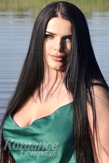 Ukrainian mail order bride Anastasiia from Kharkiv with black hair and brown eye color - image 1