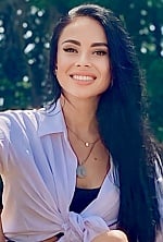 Ukrainian mail order bride Elina from Madrid with black hair and brown eye color - image 15