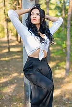 Ukrainian mail order bride Elina from Madrid with black hair and brown eye color - image 2