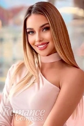Ukrainian mail order bride Diana from Kyiv with blonde hair and green eye color - image 1