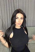 Ukrainian mail order bride Victoria from Kherson with black hair and green eye color - image 9