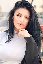 Ukrainian mail order bride Daria from Vienna with black hair and blue eye color - image 4