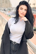 Ukrainian mail order bride Daria from Vienna with black hair and blue eye color - image 10