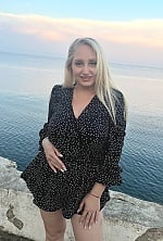 Ukrainian mail order bride Olesia from Kyiv with blonde hair and green eye color - image 7