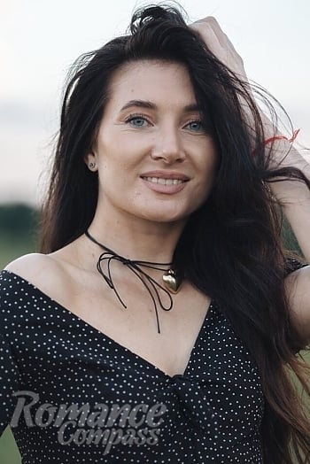 Ukrainian mail order bride Kateryna from Kyiv with light brown hair and blue eye color - image 1