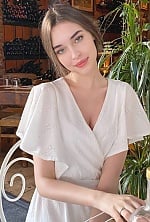 Ukrainian mail order bride Viktoriia from Kyiv with brunette hair and blue eye color - image 9