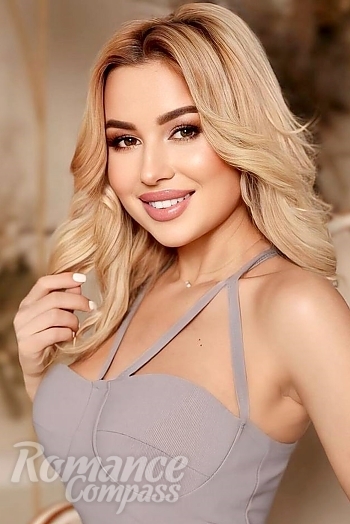 Ukrainian mail order bride Victoria from Kyiv with blonde hair and brown eye color - image 1