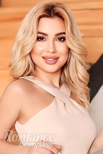 Ukrainian mail order bride Victoria from Madrid with blonde hair and brown eye color - image 1