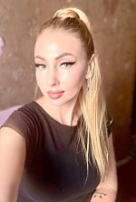 Ukrainian mail order bride Olga from Kyiv with blonde hair and green eye color - image 4