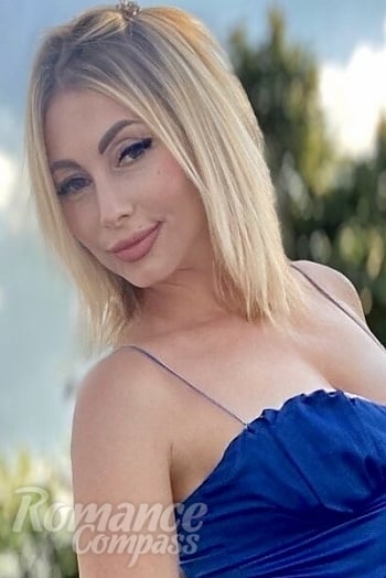 Ukrainian mail order bride Olga from Kyiv with blonde hair and green eye color - image 1