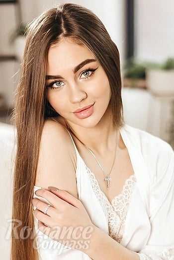 Ukrainian mail order bride Veronika from Dnipro with light brown hair and black eye color - image 1