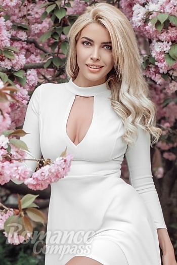 Ukrainian mail order bride Victoria from Kyiv with blonde hair and green eye color - image 1